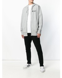 grauer bedruckter Pullover mit einem Kapuze von adidas