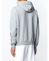 grauer bedruckter Pullover mit einem Kapuze von Omc
