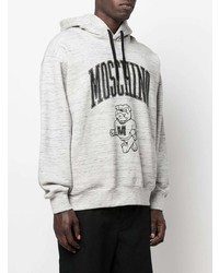 grauer bedruckter Pullover mit einem Kapuze von Moschino