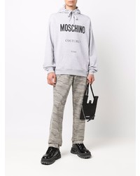 grauer bedruckter Pullover mit einem Kapuze von Moschino