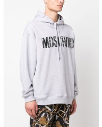 grauer bedruckter Pullover mit einem Kapuze von Moschino