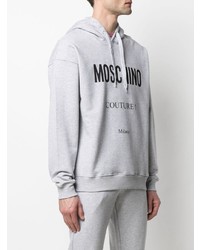 grauer bedruckter Pullover mit einem Kapuze von Moschino