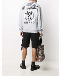 grauer bedruckter Pullover mit einem Kapuze von Moschino