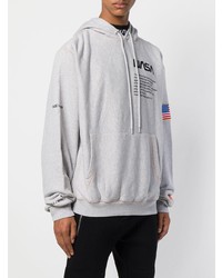 grauer bedruckter Pullover mit einem Kapuze von Heron Preston