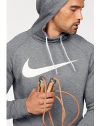 grauer bedruckter Pullover mit einem Kapuze von Nike