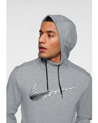 grauer bedruckter Pullover mit einem Kapuze von Nike