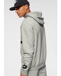 grauer bedruckter Pullover mit einem Kapuze von Nike Sportswear