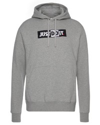 grauer bedruckter Pullover mit einem Kapuze von Nike Sportswear