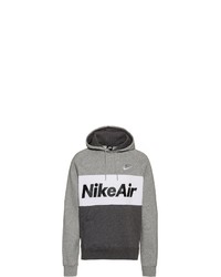 grauer bedruckter Pullover mit einem Kapuze von Nike Sportswear
