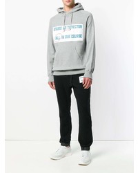 grauer bedruckter Pullover mit einem Kapuze von Sacai