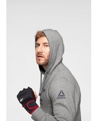 grauer bedruckter Pullover mit einem Kapuze von Reebok