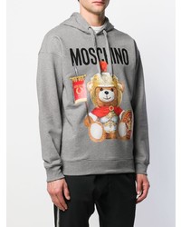 grauer bedruckter Pullover mit einem Kapuze von Moschino