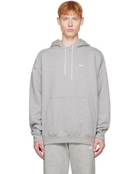 grauer bestickter Fleece-Pullover mit einem Kapuze von Nike