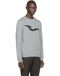 grauer bestickter Pullover mit einem Rundhalsausschnitt von Carven