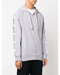 grauer Fleece-Pullover mit einem Kapuze von Moschino