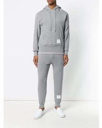 grauer Pullover mit einem Kapuze von Thom Browne