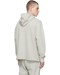 grauer Pullover mit einem Kapuze von John Elliott