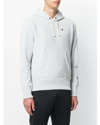 grauer Pullover mit einem Kapuze von Champion