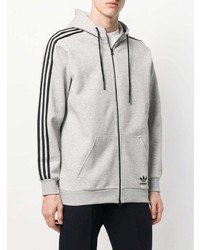 grauer Pullover mit einem Kapuze von adidas