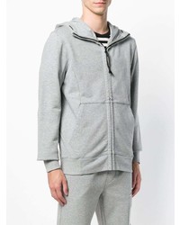 grauer Pullover mit einem Kapuze von CP Company