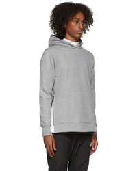 grauer Pullover mit einem Kapuze von John Elliott