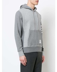 grauer Pullover mit einem Kapuze von Thom Browne