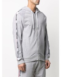 grauer Pullover mit einem Kapuze von Moschino