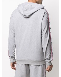 grauer Pullover mit einem Kapuze von Moschino