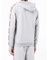 grauer Pullover mit einem Kapuze von Moschino