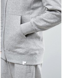 grauer Pullover mit einem Kapuze von adidas