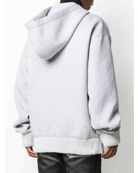 grauer Pullover mit einem Kapuze von Moschino