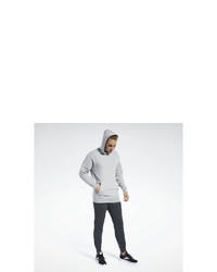 grauer Pullover mit einem Kapuze von Reebok