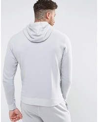 grauer Pullover mit einem Kapuze von New Era