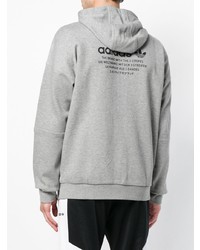 grauer Pullover mit einem Kapuze von adidas