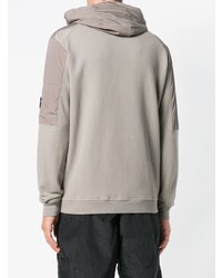 grauer Pullover mit einem Kapuze von CP Company