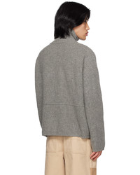 grauer Pullover mit einem Reißverschluss am Kragen von Axel Arigato