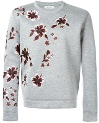 grauer Pullover mit einem Rundhalsausschnitt mit Blumenmuster von Valentino