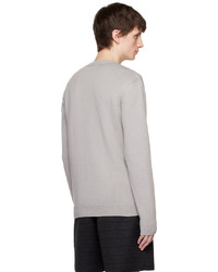 grauer Pullover mit einem Rundhalsausschnitt von Moschino
