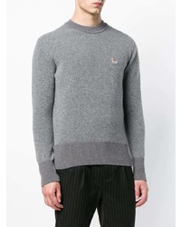 grauer Pullover mit einem Rundhalsausschnitt von MAISON KITSUNÉ