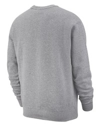 grauer Pullover mit einem Rundhalsausschnitt von Nike Sportswear