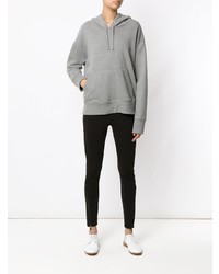 grauer Pullover mit einer Kapuze von OSKLEN