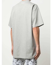 graues bedrucktes T-Shirt mit einem Rundhalsausschnitt von Vetements