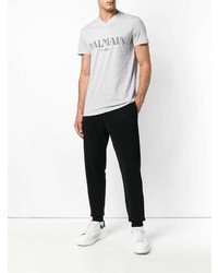 graues bedrucktes T-Shirt mit einem V-Ausschnitt von Balmain