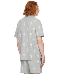 graues besticktes Polohemd von Thom Browne