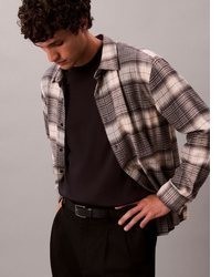graues Langarmhemd mit Schottenmuster von Calvin Klein Jeans