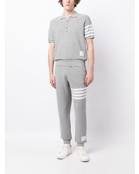 graues Polohemd von Thom Browne