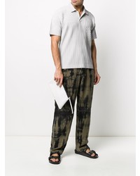 graues Polohemd von Homme Plissé Issey Miyake