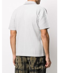 graues Polohemd von Homme Plissé Issey Miyake