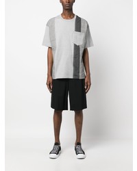 graues T-Shirt mit einem Rundhalsausschnitt mit Flicken von Comme des Garcons Homme