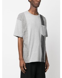 graues T-Shirt mit einem Rundhalsausschnitt mit Flicken von Comme des Garcons Homme